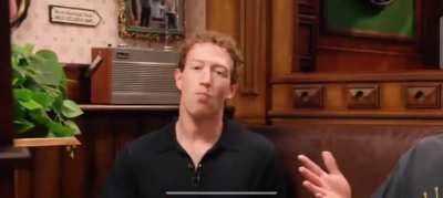 Mark Zuckerberg pretending to enjoy Guinness