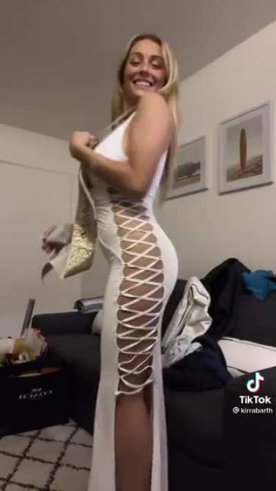 Blonde slut showing off her massive tits