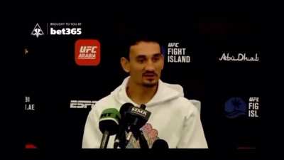 UFC fighter Max Holloway sounds off his frustrations with the DMR and Stim glitch in Warzone during a press conference