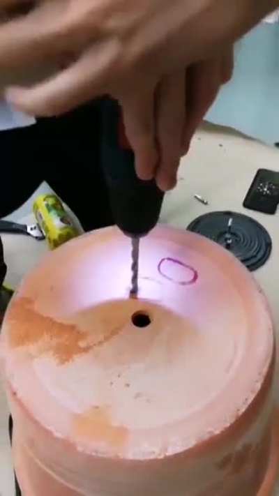 Trying to make a makeshift smoker with a plant pot.