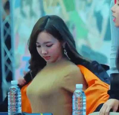 Nayeon - beige sweater, black jacket