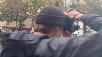 In France, police rush out to the people, expecting them to rush and create a stampede. No one moves and the police are forced to back down