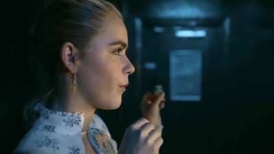 Kiernan Shipka warming up before two buds share her body