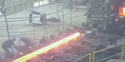 china 2/20/2023. Mill worker gets his entire butt branded by some sort of molten metal rod.