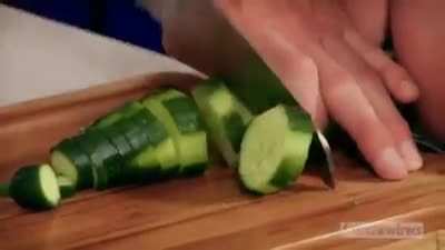 The way he cuts the cucumber