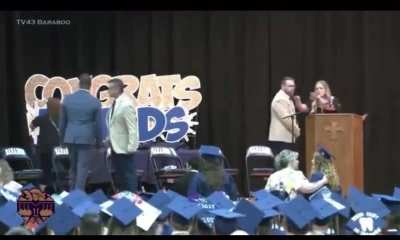 Superintendent attacked during the graduation; the unnamed attacker was a father who didn’t want his graduating daughter to shake the hand of a black man