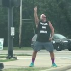 This guy who is dancing just to make people smile!