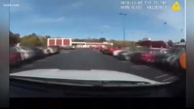 Cop t-bones student in parking lot during bomb threat