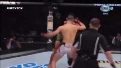 Yair Rodríguez lays out The Korean Zombie in the last second of their fight.