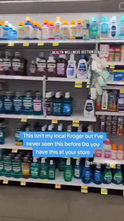 An American showed Kroger’s new security setup. Entire aisles are now barricaded off. Shoppers are let into secured sections, then held until items are locked up or carried to the register by staff.