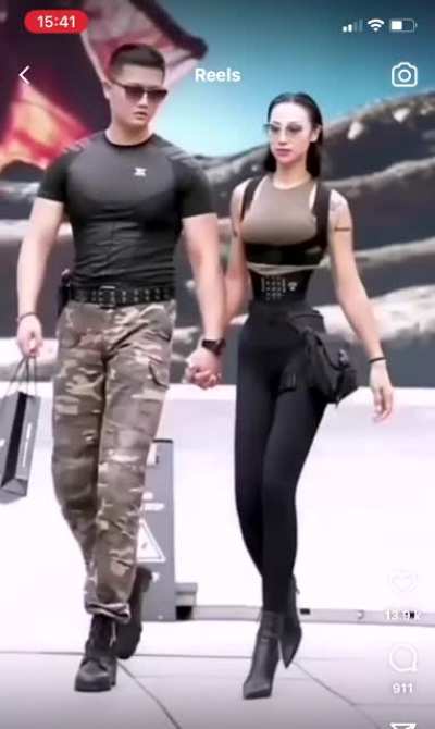 the shopping bag becomes a different shape when it’s passed in front of her legs