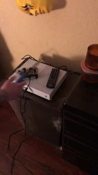 My boyfriend’s Xbox turns on when he uses a lighter.