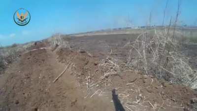 NLF fighter wearing a GoPro confronts a Syrian Army advance with RPGs & a PKM - al-Jabain - 2019