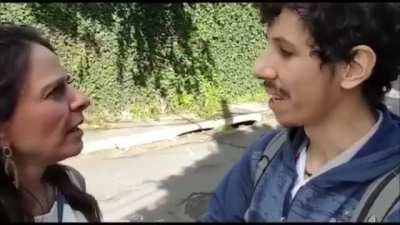 Invasor argumenta para a dona da propriedade que ele está certo ao invadi-la por não cumprir função social.