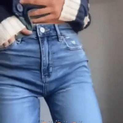 Jenna shows off her cameltoe and tight ass in jeans