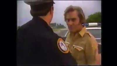 Country music star, George Jones, arrested for driving drunk. He attacks the cameraman. 1982