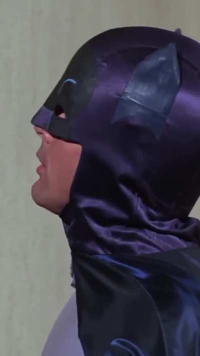 Batman literally carries a wall hook...