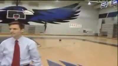 This reporter was covering the Olathe Kansas High School coach who hit the amazing blindfolded half court shot