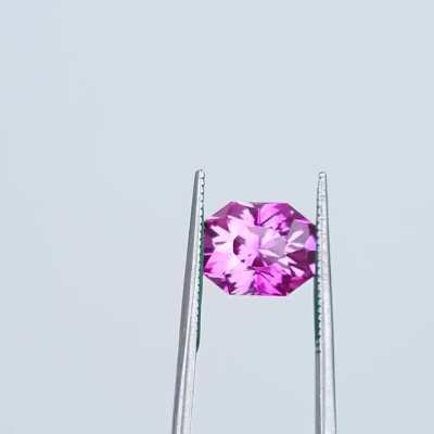 9x7.3mm Pink/Paraiba Lab Sapphire in an Elongated Void Reaver. $450 +sh