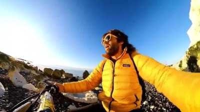 HMRB jumping a mini bike off a cliff