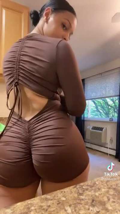 BODY SHAPED LIKE A COKE BOTTLE