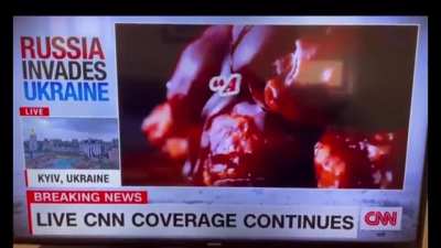 Ukraine gets air raided and CNN decided to air a “fried chicken” Applebee’s Ad