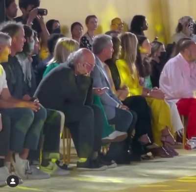 Larry David at Fashion Week NYC and having a great time