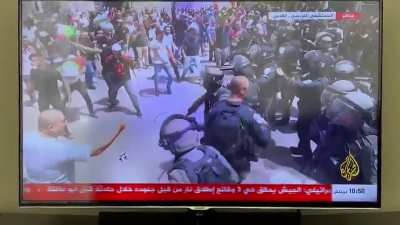 Heavily armed Israeli forces are beating up Palestinians carrying assassinated journalist Shireen Abu Akleh’s coffin and threw sound bombs inside hospital grounds.