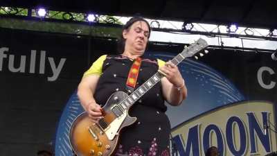 Joanna Connor shredding the guitar