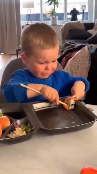 holding the sticks with two hands