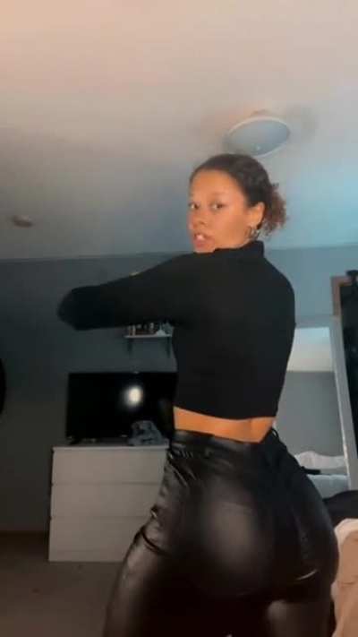 Ana in black leather