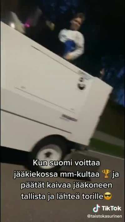 Finnish hockey fans going to celebrate on a zamboni after Finland wins the World Championship