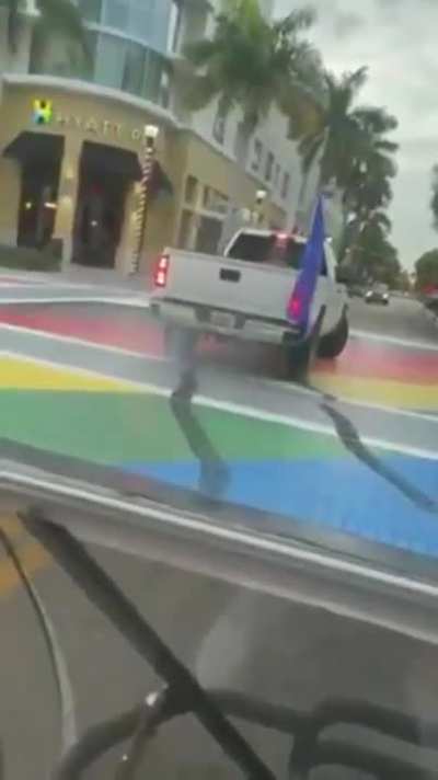 Florida MAGA celebrates Trump's birthday by using his pickup truck to ruin a Pride crosswalk. This Florida MAGA has been arrested, and faces a hate crimes charge.