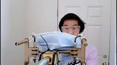 Guy Creates Gun That Shoot Masks Onto People's Faces