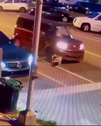 Dragged by car and still gets up
