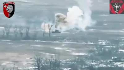 Drone footage of an attack by the Ukrainian 63rd Mechanized Brigade on a Russian tank driving alone through the fields of southern Ukraine. The tank turns into a flaming inferno quickly and only one burning Russian crewman seems to be able to escape the v