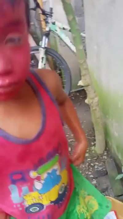 Kid trying to take off paint from his finger