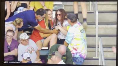 Creepy grown man fights two girls for a baseball in their laps that he didn’t try to catch