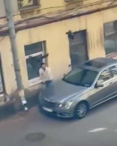 Man fighting crows