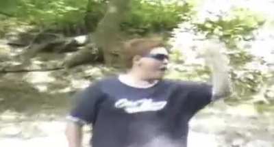 Kid freaks out over getting shot by a paintball gun
