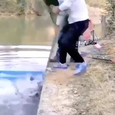 This guys pulling out overloaded fishing net