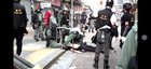 Police caught on camera planting metal rod as evidence, as opposed to the PVC stick that the shot protester was using.
