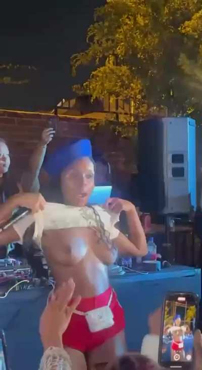 Janelle Monae flashing at a concert