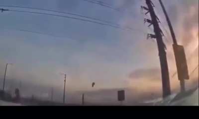 biker gets sent flying in the air after hitting a car