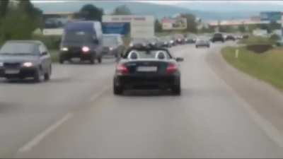 Driver was a politician from Christian-democratic movement. He later said, he was making a way for ambulance.