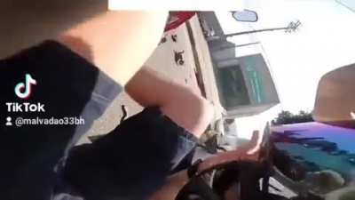 Distracted motorcyclist hit a car.