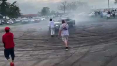 Standing in the path of an idiot doing donuts
