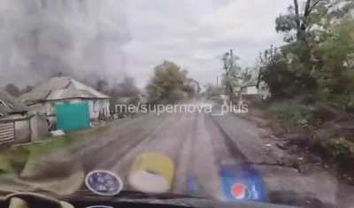 Ukrainian soldiers advancing under Russian artillery attack. date & location unknown