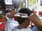 Man can cut his own hair with no help
