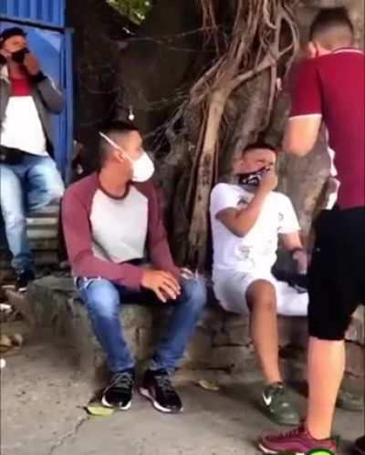 Smacking and publicly shaming people who wear a mask down on their chin